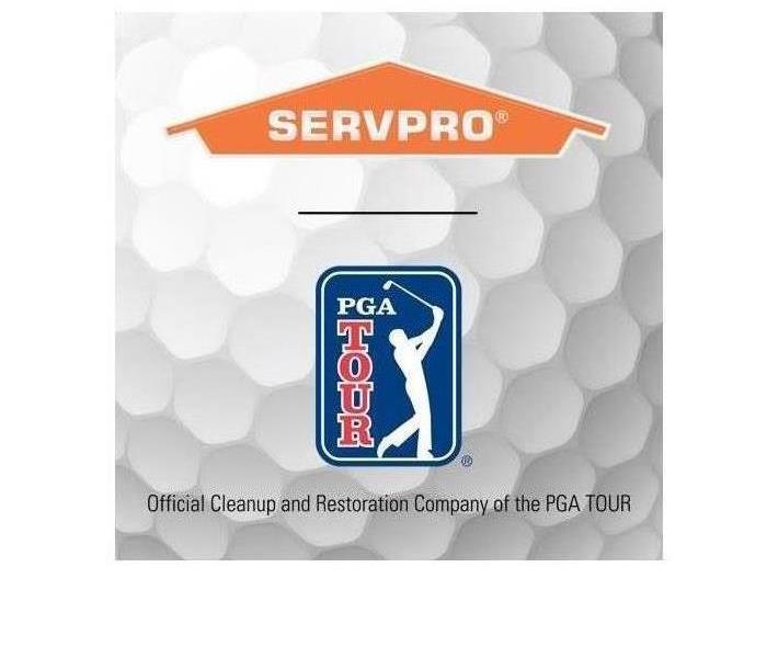Close up view of a golf ball with SERVPRO and PGA Tour on it