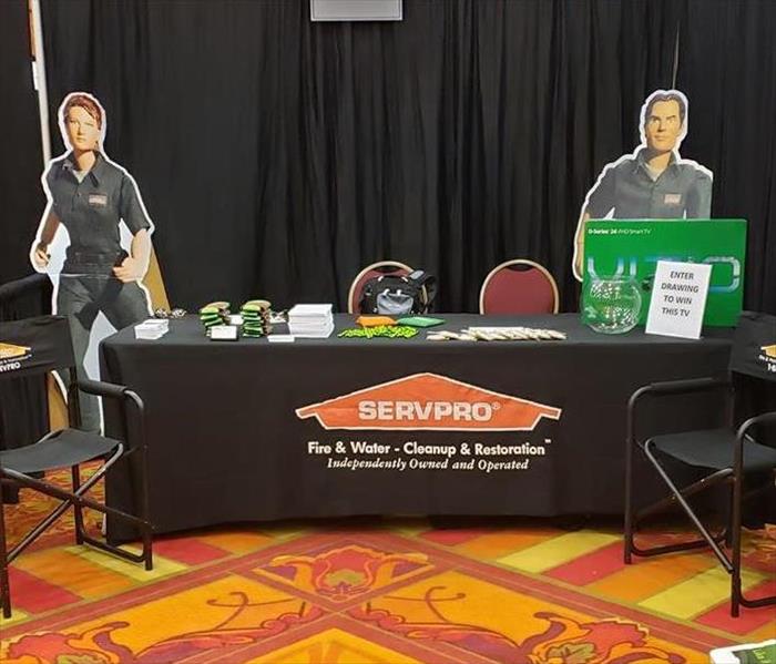 an information table with SERVPRO marketing material around it