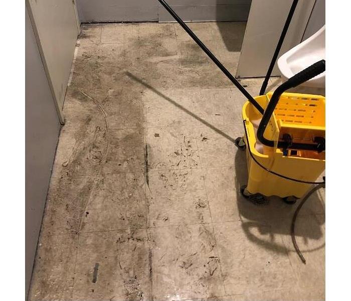soot covered floor in bathroom 