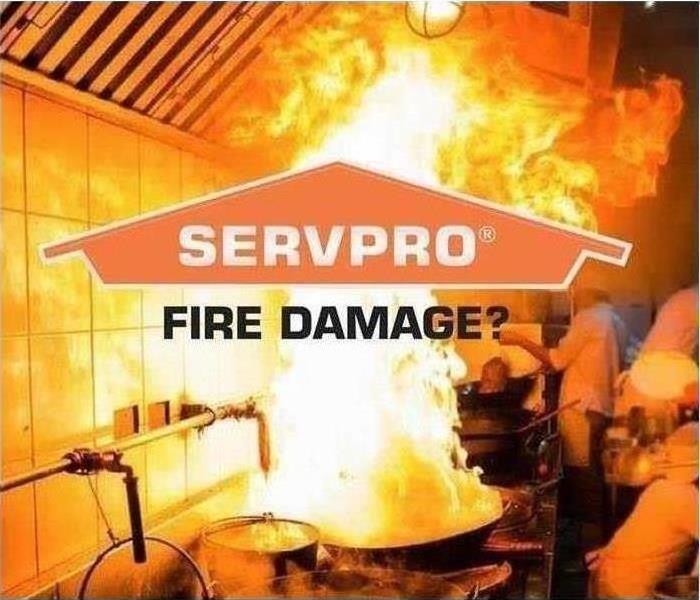 A large orange flame on a stove, says SERVPRO Fire Damage in the middle.